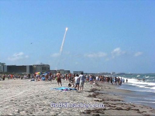 Crowd watching Space Shuttle Launch from beach at Cocoa Beach Florida June 2008