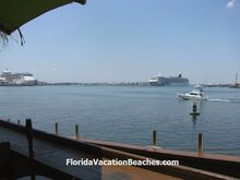 View of Cruise Ships in Harbor from Millikens Reef outdoor dining deck.